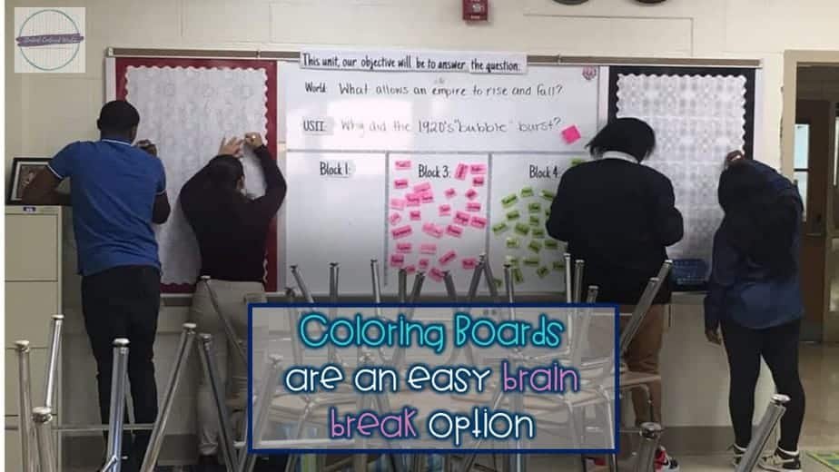 Five students gather at a whiteboard, engaging with colorful sticky notes under questions about empires and the 1930s. Chairs are stacked nearby. A text overlay reads, "Coloring Boards are part of our Brain Breaks for kids—a simple and effective way to refresh young minds.