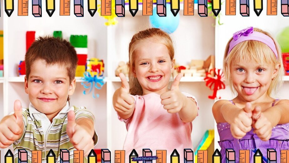 Three young children smiling and giving thumbs up sit in a colorful classroom, perhaps celebrating character-based awards. The image is bordered with orange rulers and black pencils, adding a playful, school-themed frame.