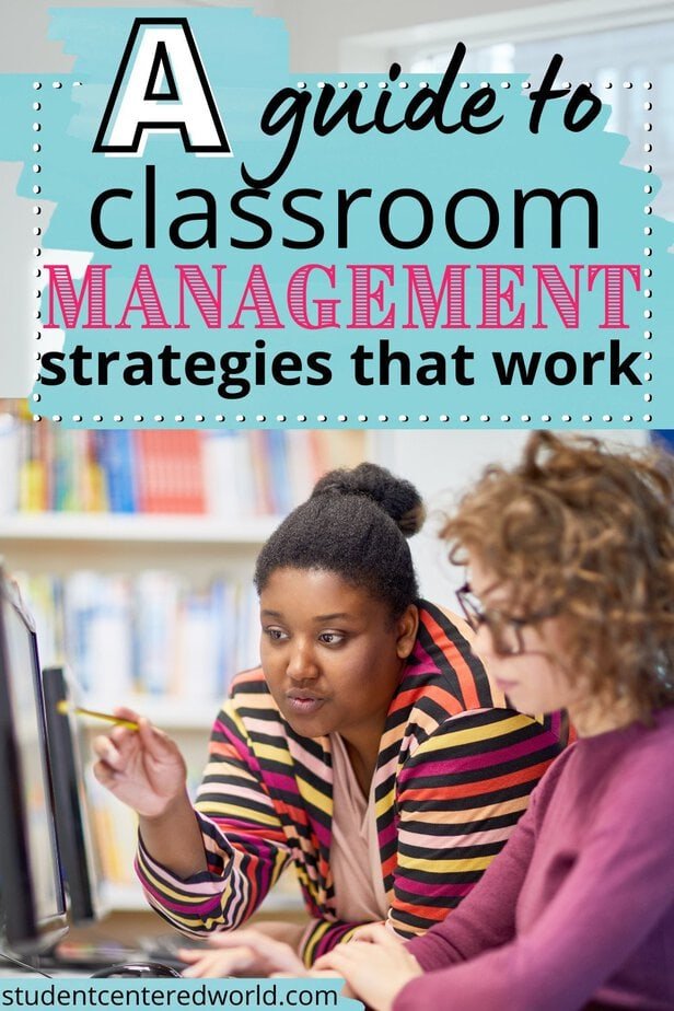 Two women discuss something on a computer screen in a classroom. Overlay text reads, A guide to strategies for classroom management that work. Bookshelves are visible in the background.
