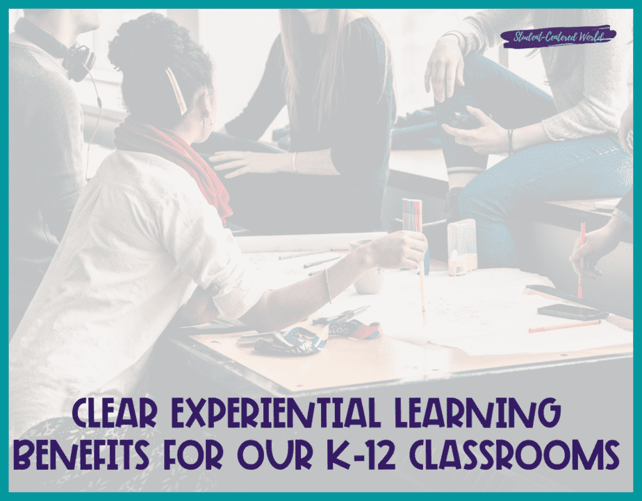 A group of people sits around a table covered with notes and markers, deeply engaged in discussion about the experiential learning benefits. The text reads, Clear advantages for our K-12 classrooms. A small banner in the corner says, Student-Centered World.