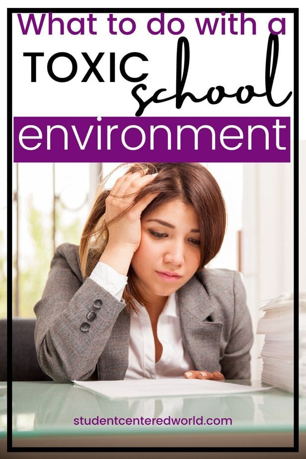A woman in a gray blazer sits at a desk with papers, looking stressed. Text above reads, What to do with a toxic school culture?.